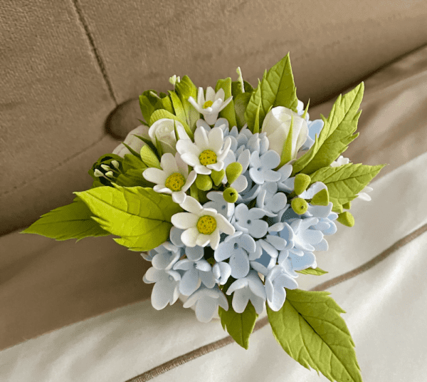 Daisy and light blue flowers