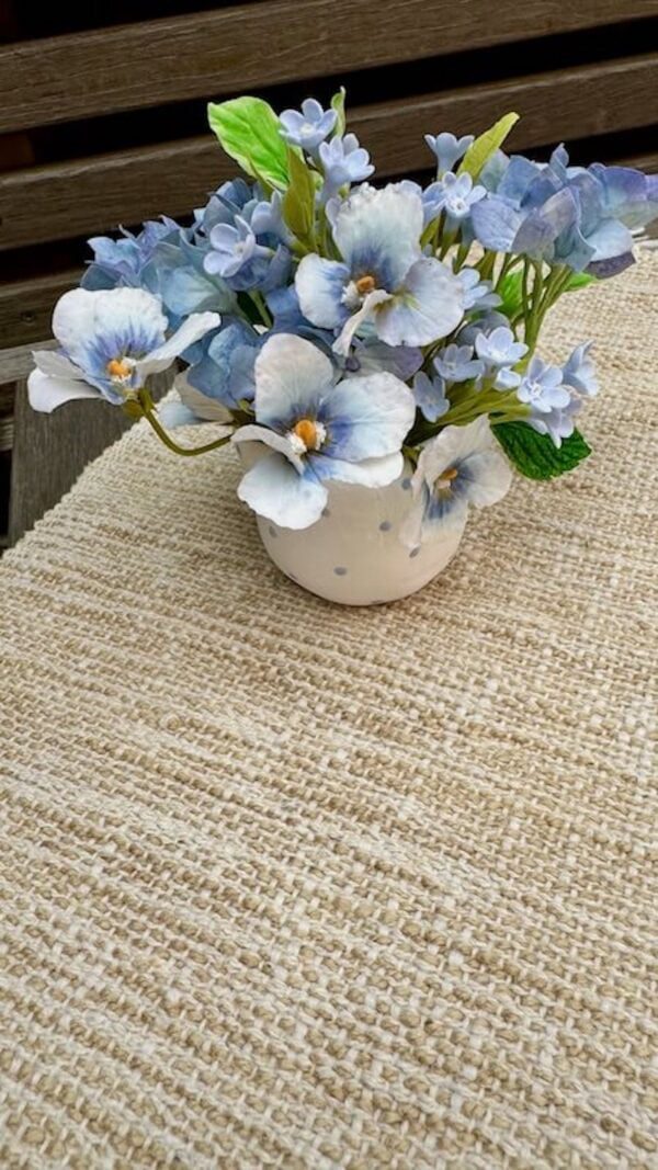 Polka dots vase with blue flowers