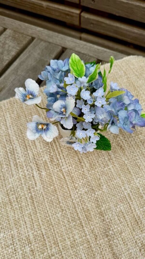 miniature blue flowers bouquet