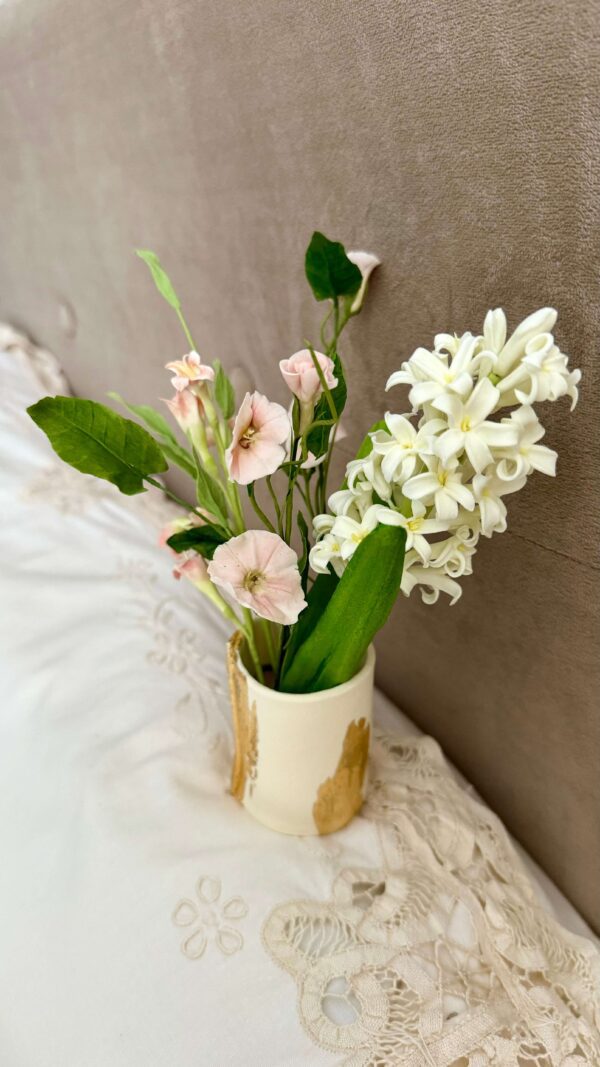 white hyacinth bouquet and pink bindweed miniature arrangement